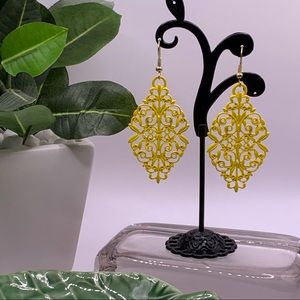 3 for $15.  Very pretty bright yellow drop pierced earrings.